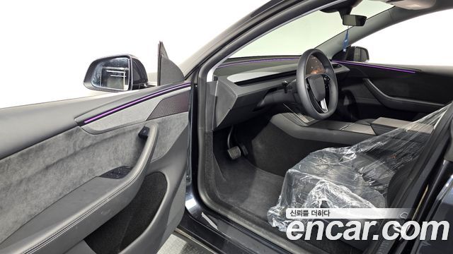 Tesla Model Y 2025 — photo 13