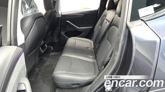 Tesla Model Y 2025 — photo 17