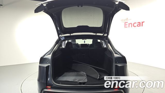 Tesla Model Y 2025 — photo 23