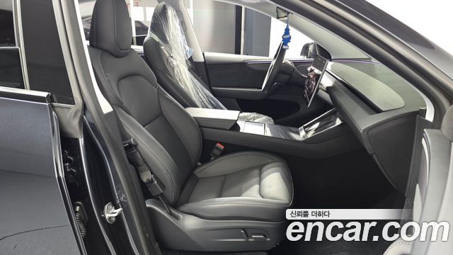 Tesla Model Y 2025 — photo 16
