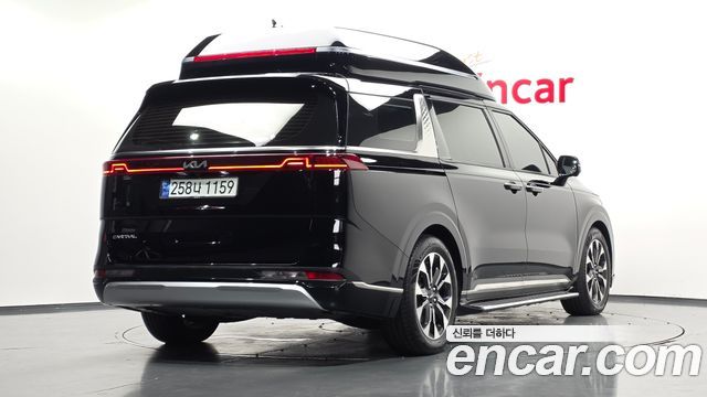Kia Canival 2023 — photo 2