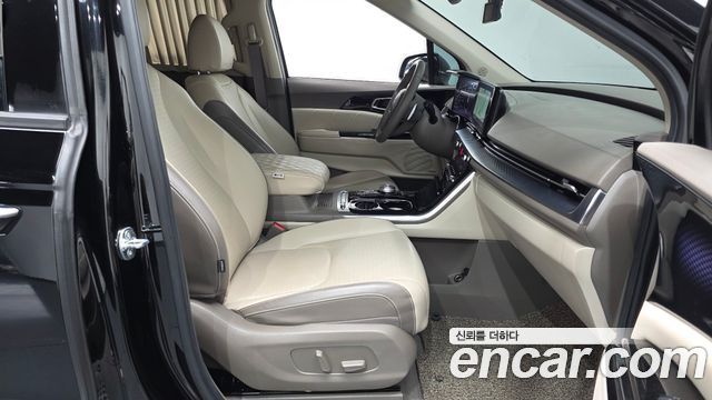 Kia Canival 2023 — photo 11