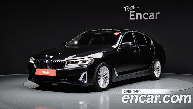 BMW 5-Series 2023 — photo 1