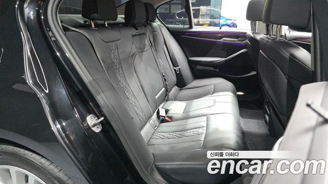 BMW 5-Series 2023 — photo 17