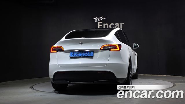 Tesla Model Y 2024 — photo 4