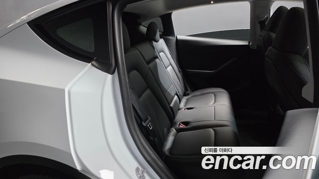 Tesla Model Y 2024 — photo 17