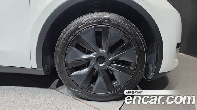 Tesla Model Y 2024 — photo 7