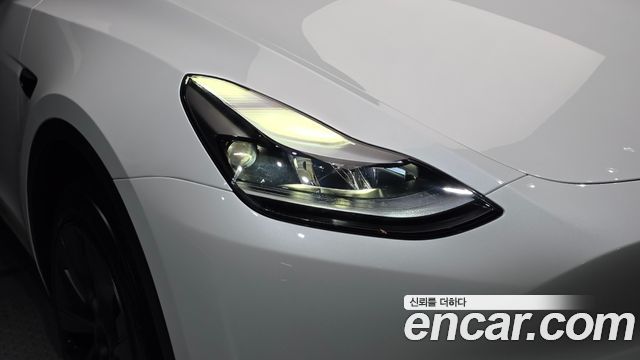 Tesla Model Y 2024 — photo 8