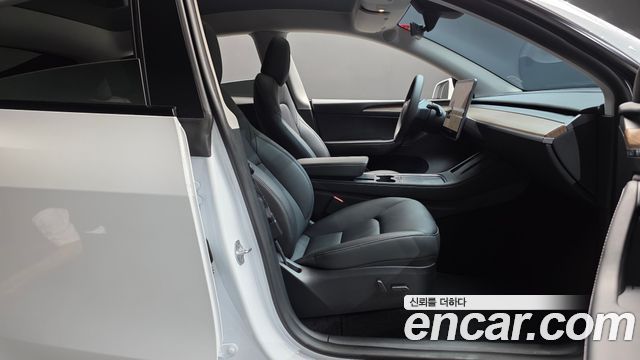 Tesla Model Y 2024 — photo 16