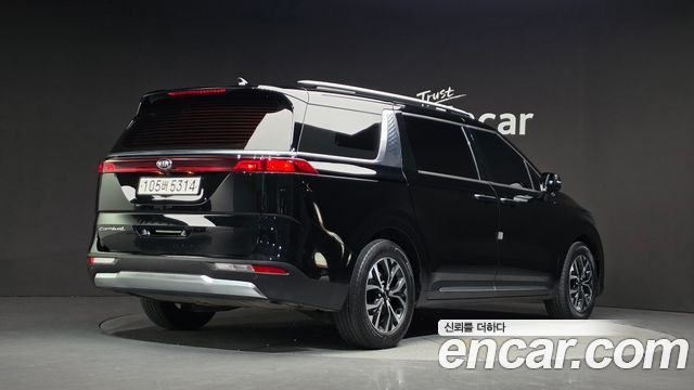 Kia Canival 2021 — photo 2