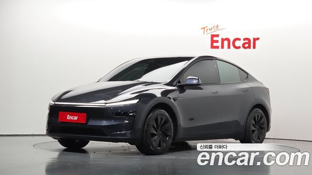 Tesla Model Y 2025 — photo 1