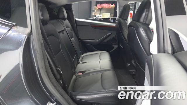 Tesla Model Y 2025 — photo 18