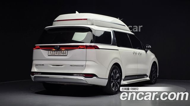 Kia Canival 2021 — photo 2