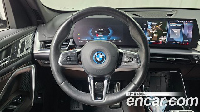 BMW iX1 2023 — photo 19