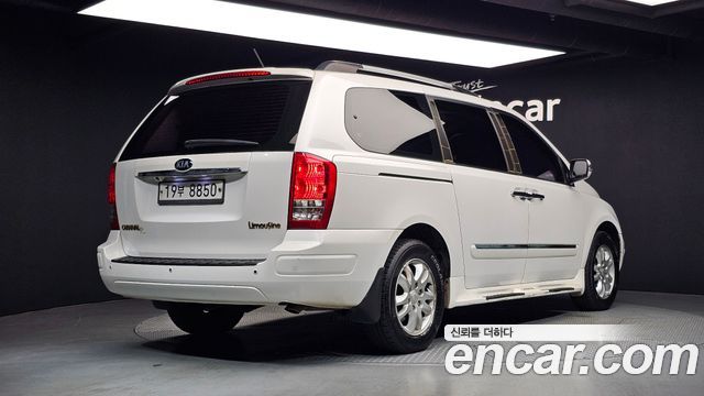 Kia Canival 2013 — photo 2