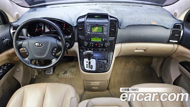Kia Canival 2013 — photo 7