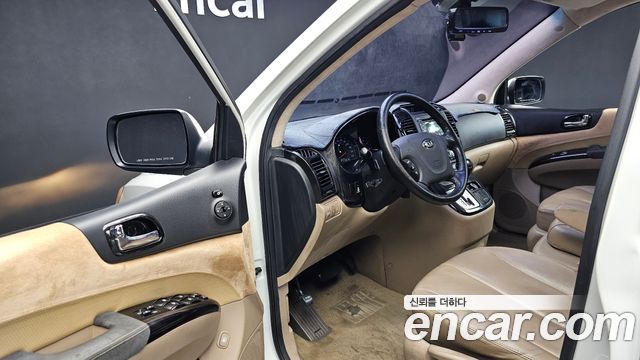 Kia Canival 2013 — photo 10