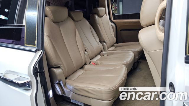 Kia Canival 2013 — photo 11