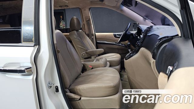 Kia Canival 2013 — photo 12