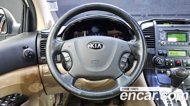 Kia Canival 2013 — photo 14