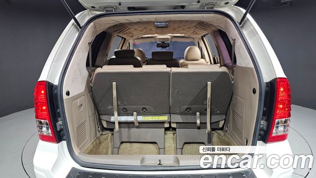 Kia Canival 2013 — photo 20