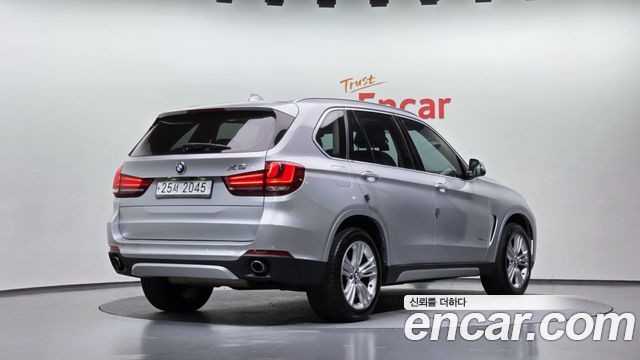 BMW X5 2015 — photo 2