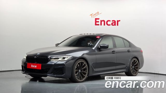 BMW 5-Series 2021 — photo 1