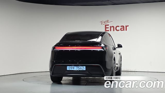 Tesla Model Y 2025 — photo 4