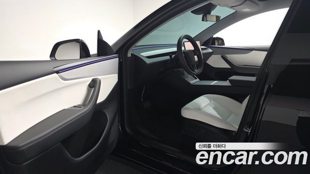 Tesla Model Y 2025 — photo 13