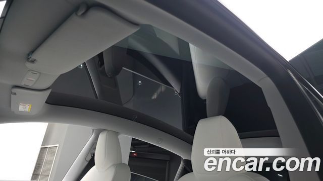 Tesla Model Y 2025 — photo 22