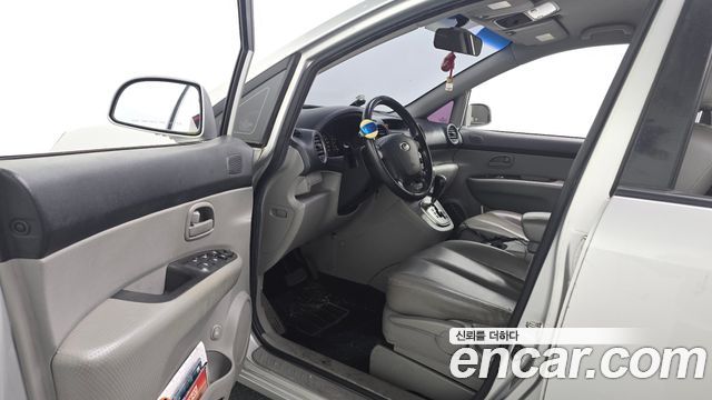 Kia Carens 2008 — photo 10