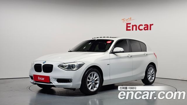 BMW 1-Series 2014 — photo 1