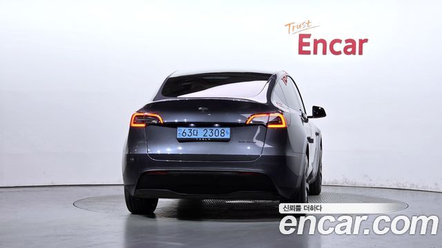 Tesla Model Y 2024 — photo 4