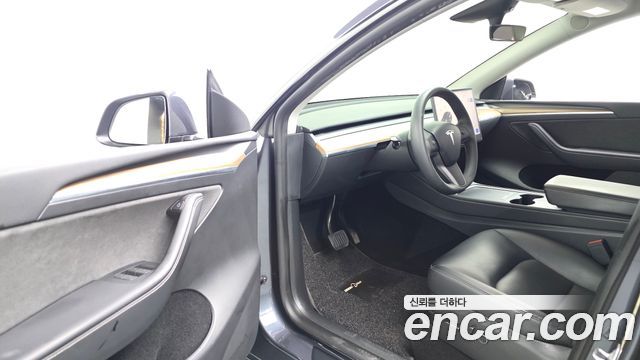 Tesla Model Y 2024 — photo 13