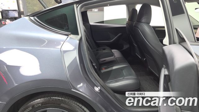Tesla Model Y 2024 — photo 17