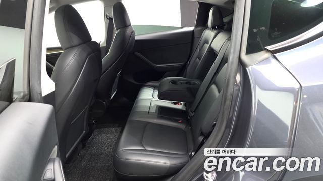 Tesla Model Y 2024 — photo 18