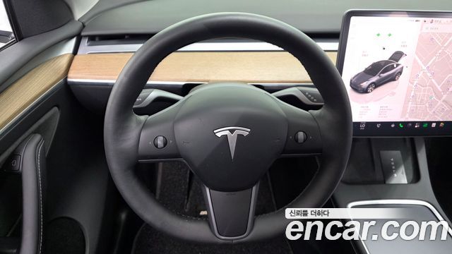 Tesla Model Y 2024 — photo 20