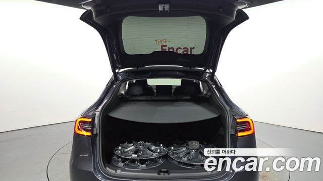 Tesla Model Y 2024 — photo 24