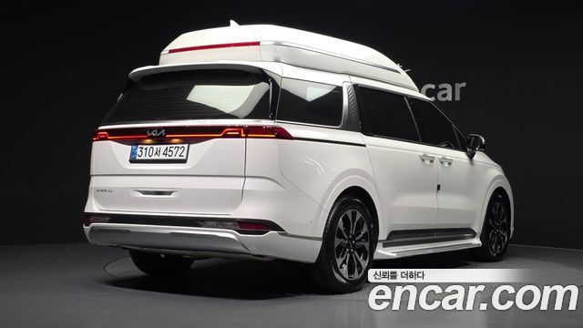 Kia Canival 2023 — photo 2