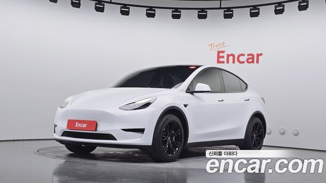 Tesla Model Y 2024 — photo 1