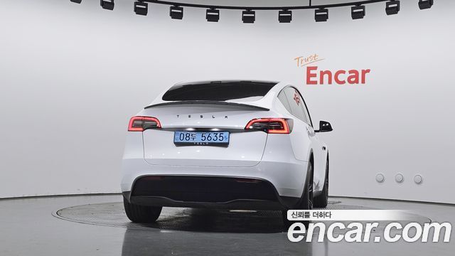 Tesla Model Y 2024 — photo 4