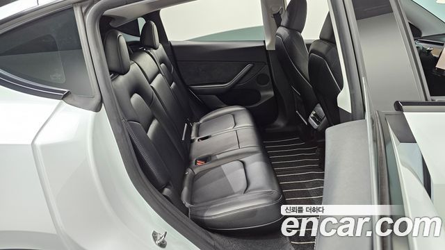 Tesla Model Y 2024 — photo 17