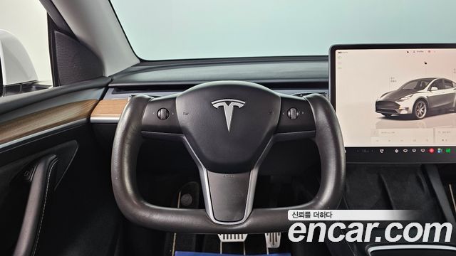 Tesla Model Y 2024 — photo 19
