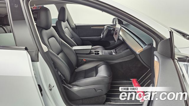 Tesla Model Y 2024 — photo 16