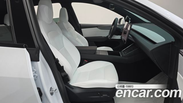 Tesla Model Y 2026 — photo 16