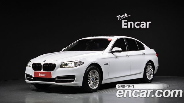 BMW 5-Series 2015 — photo 1