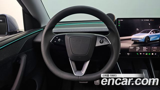 Tesla Model Y 2025 — photo 13