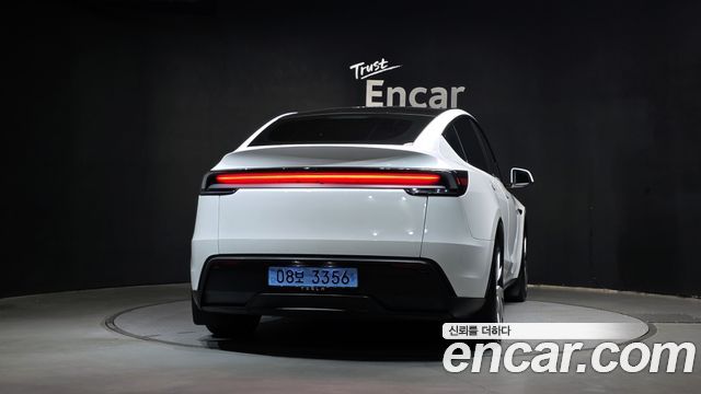 Tesla Model Y 2025 — photo 4