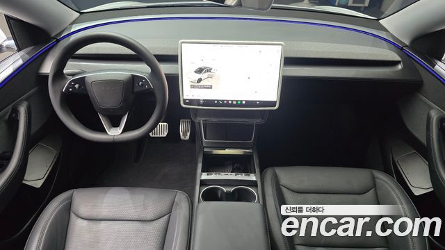 Tesla Model Y 2025 — photo 10