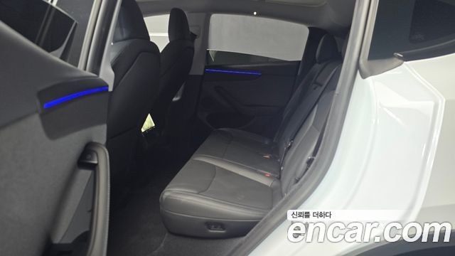 Tesla Model Y 2025 — photo 18